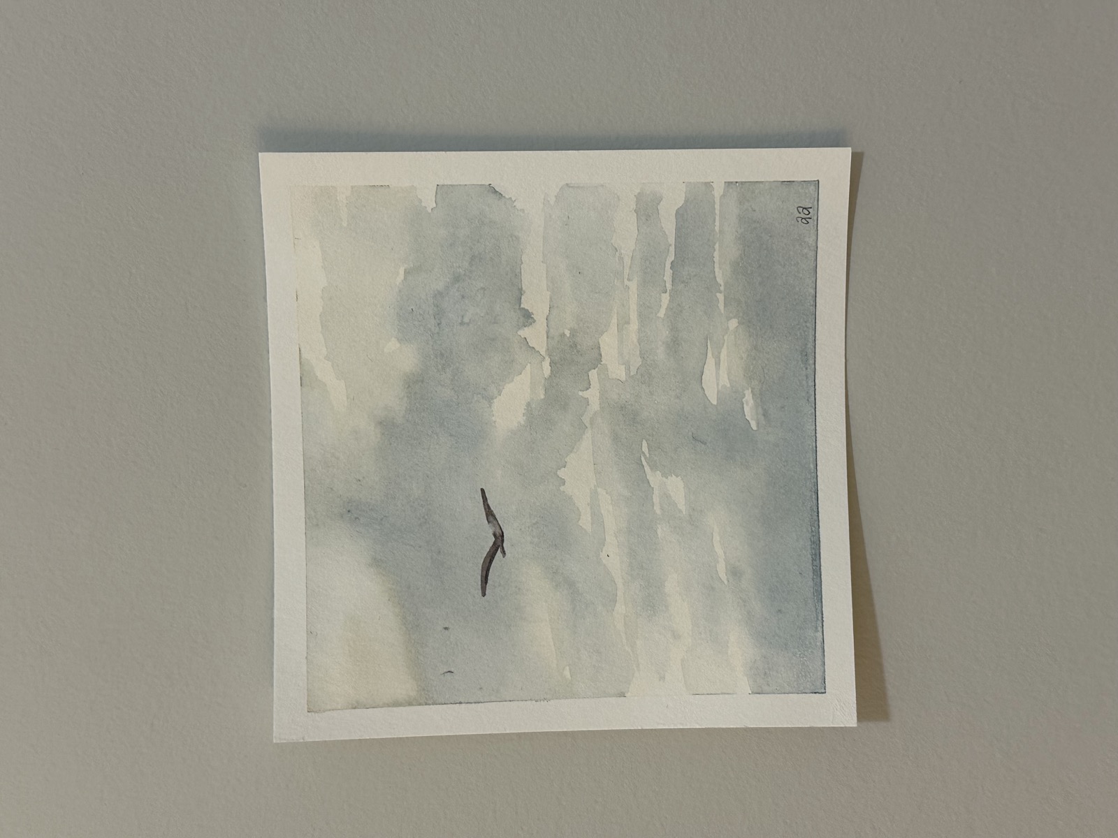 Watercolor painting of a bird flying through clouds